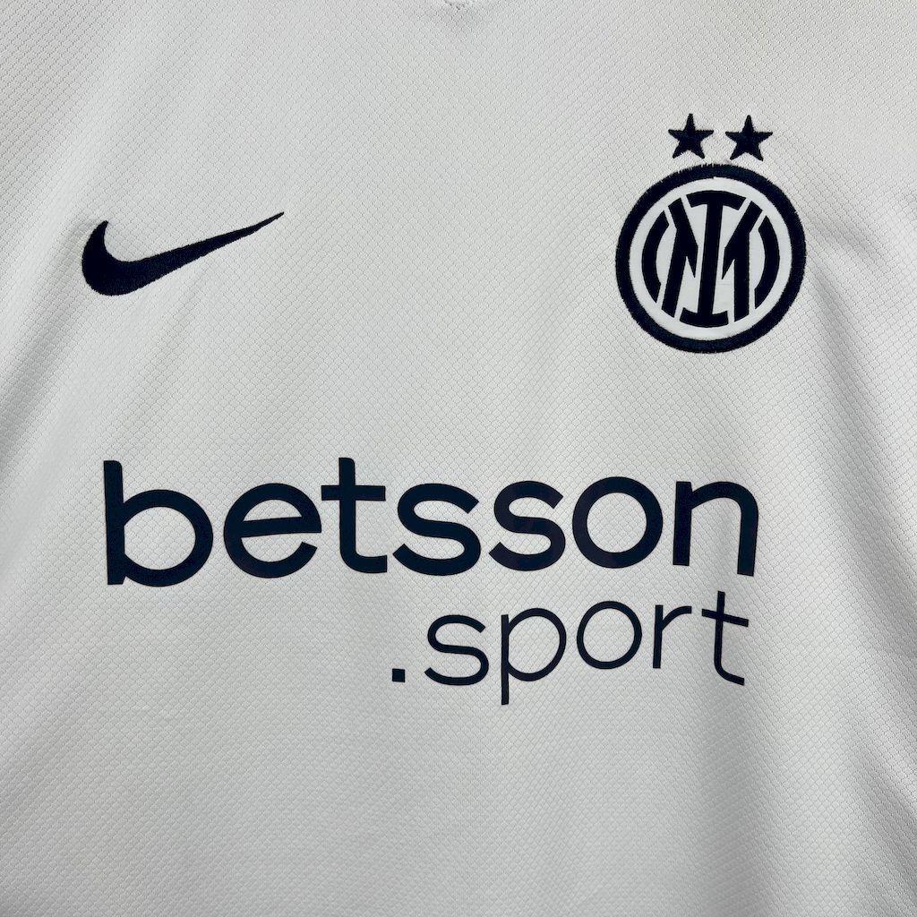 White Inter Milan away fan jersey chest with betsson.sport sponsor and crest