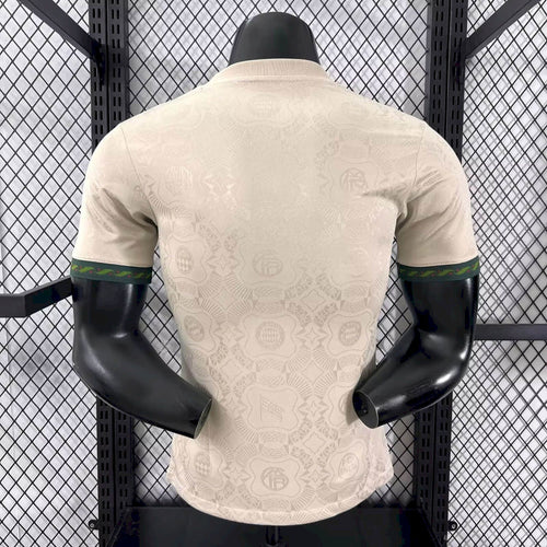 White Bayern Munich Oktoberfest player jersey, back view with green sleeve stripe detail