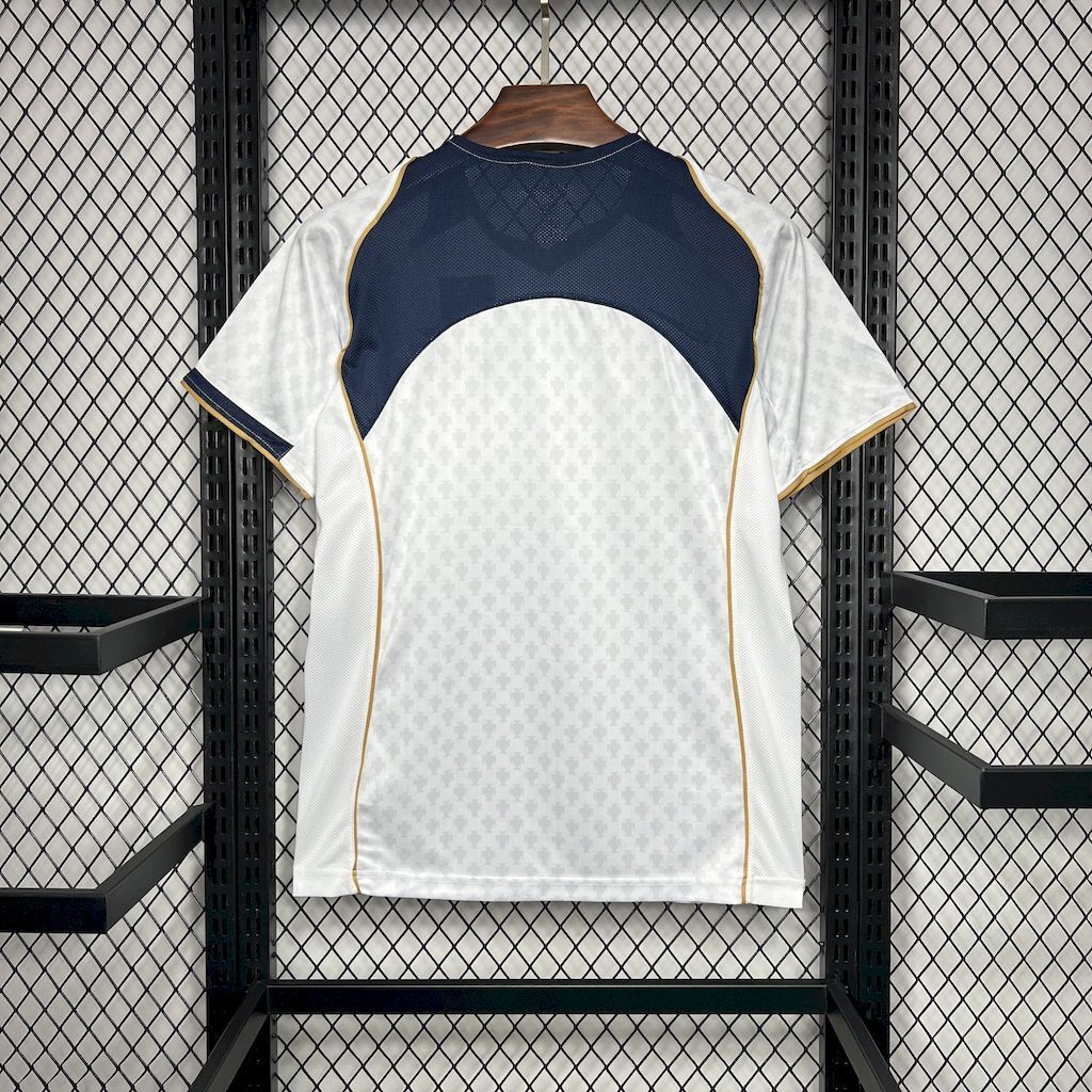 White Portugal away soccer jersey back view with navy shoulders, gold piping
