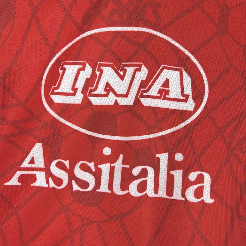 Red jersey chest features IN A logo and As sitalia text in white.