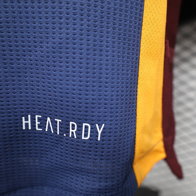 Blue jersey sleeve detail with HeatRdy text and yellow side stripe