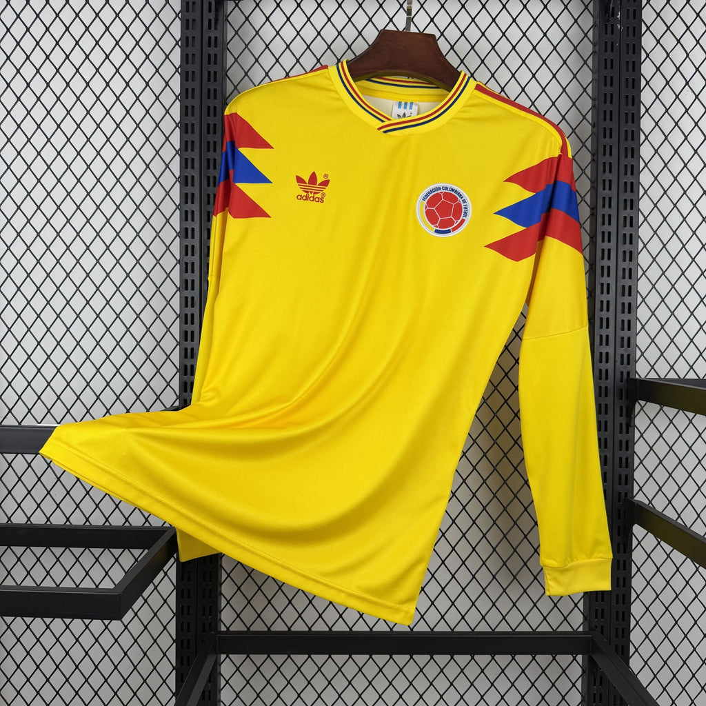 Long-sleeve Colombia home soccer jersey, yellow with red/blue sleeve graphic and crest