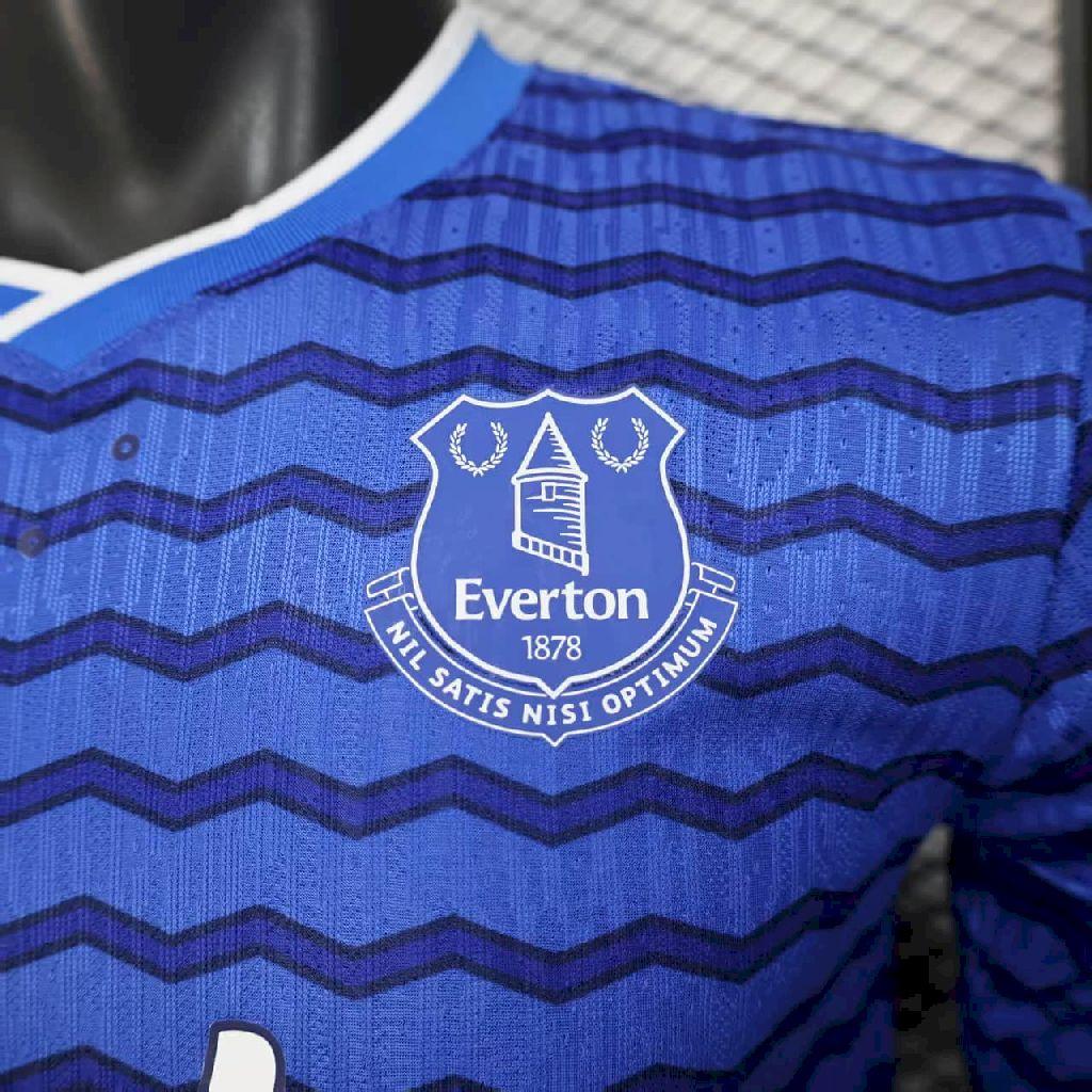 Blue Everton home football shirt with zigzag pattern and white club crest