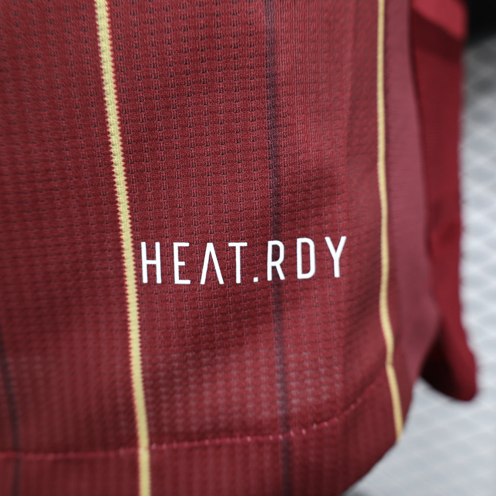 Maroon Roma jersey fabric close-up with “HEAT.RDY” logo