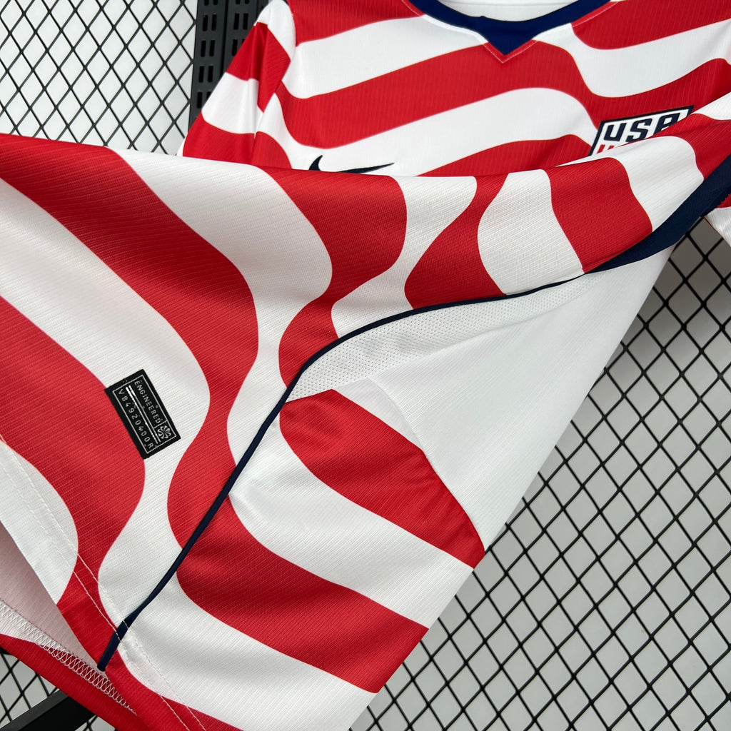USA soccer jersey with red and white wavy stripes and a Nike swoosh on the chest