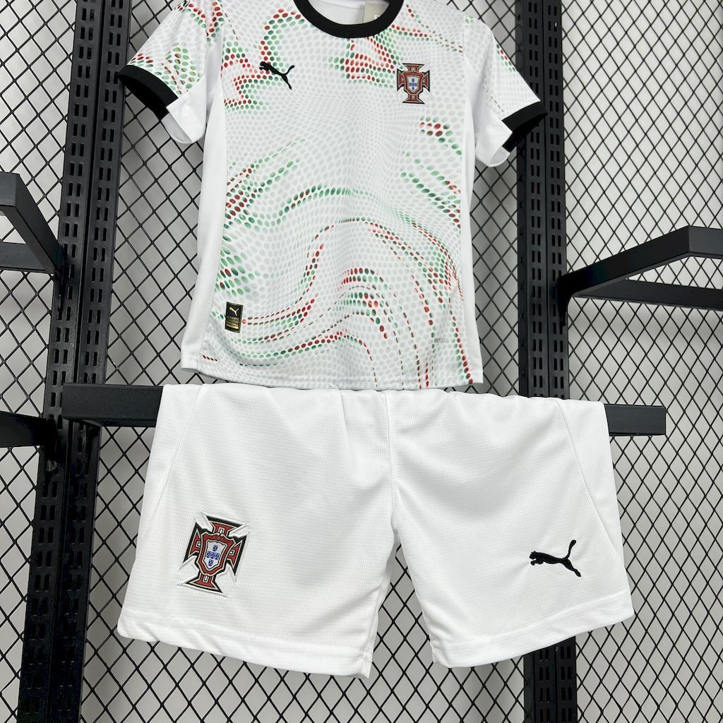 Kids Portugal away soccer kit: white jersey with crest and Puma, paired with white shorts
