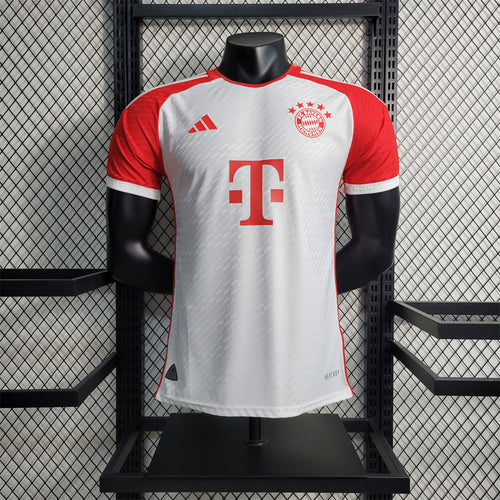 Home football jersey on mannequin, white body with red sleeves and black crew neck