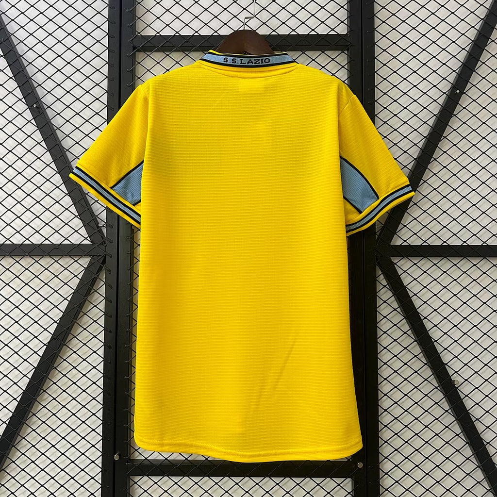 Yellow retro soccer jersey back view with light blue shoulder stripes