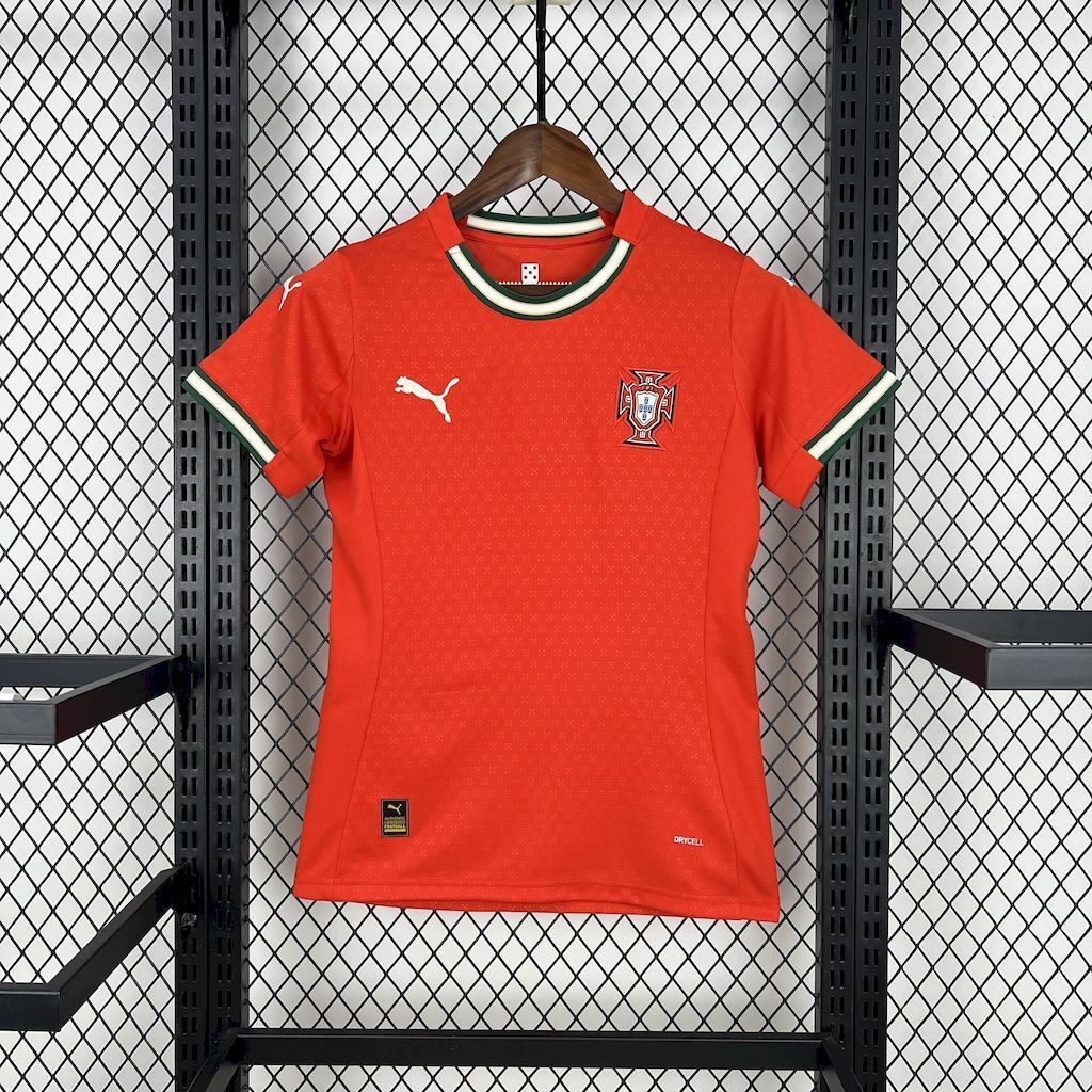 Women's red home football jersey with crest, Puma logo, and green-trim collar