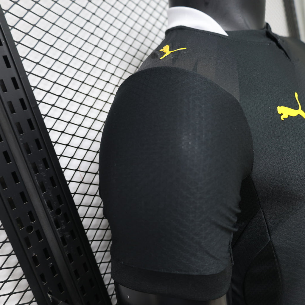 Borussia Dortmund away football jersey (player version) with yellow PUMA logo on dark sleeve