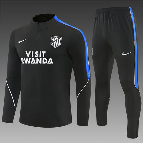 Black quarter-zip training top and jogger pants set with blue side stripes and logos