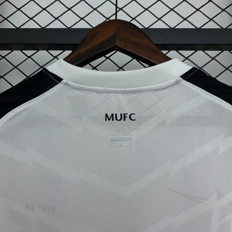 White away jersey back neck with MUFC text