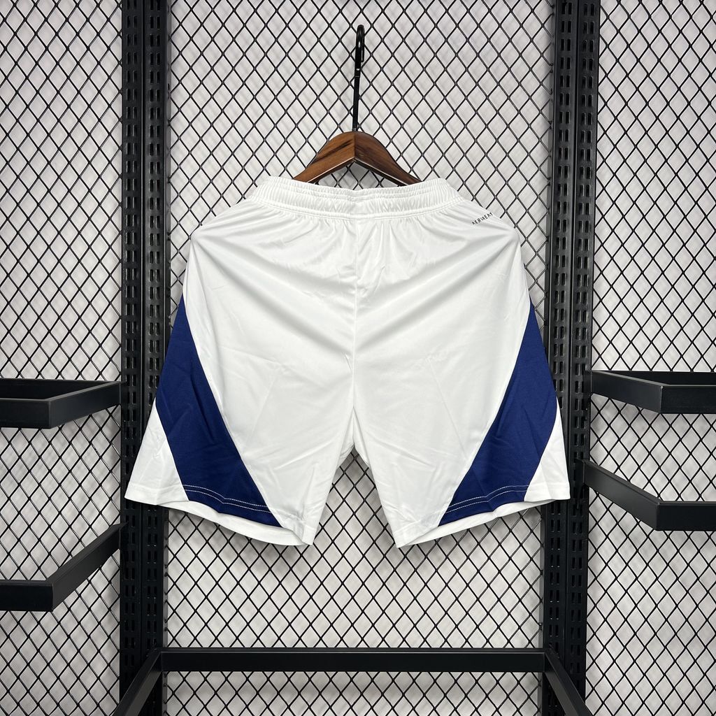 Arsenal home fan football shorts, white with navy side panels, back view