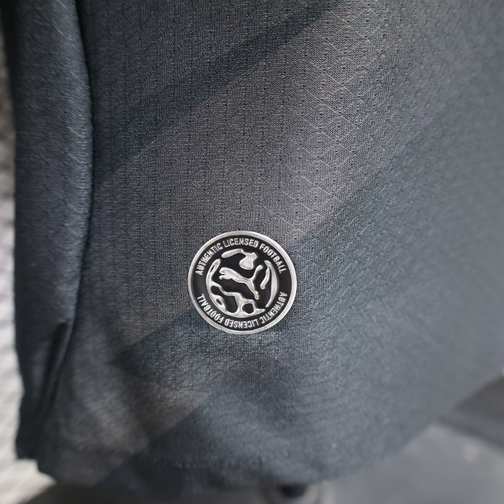 Borussia Dortmund away football jersey (player version) with round official-licensed patch on dark fabric