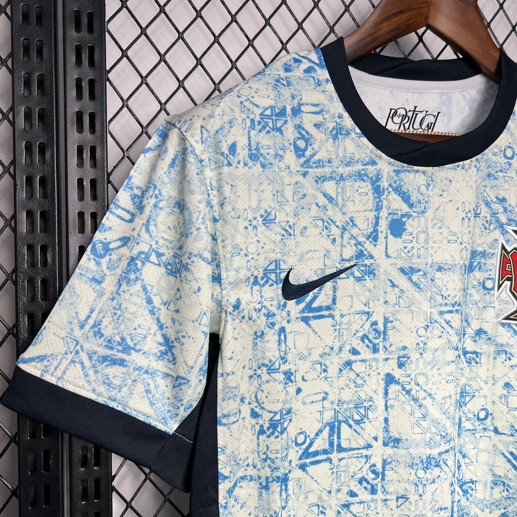 Light blue fan jersey with black crew collar, Nike swoosh, and patterned fabric