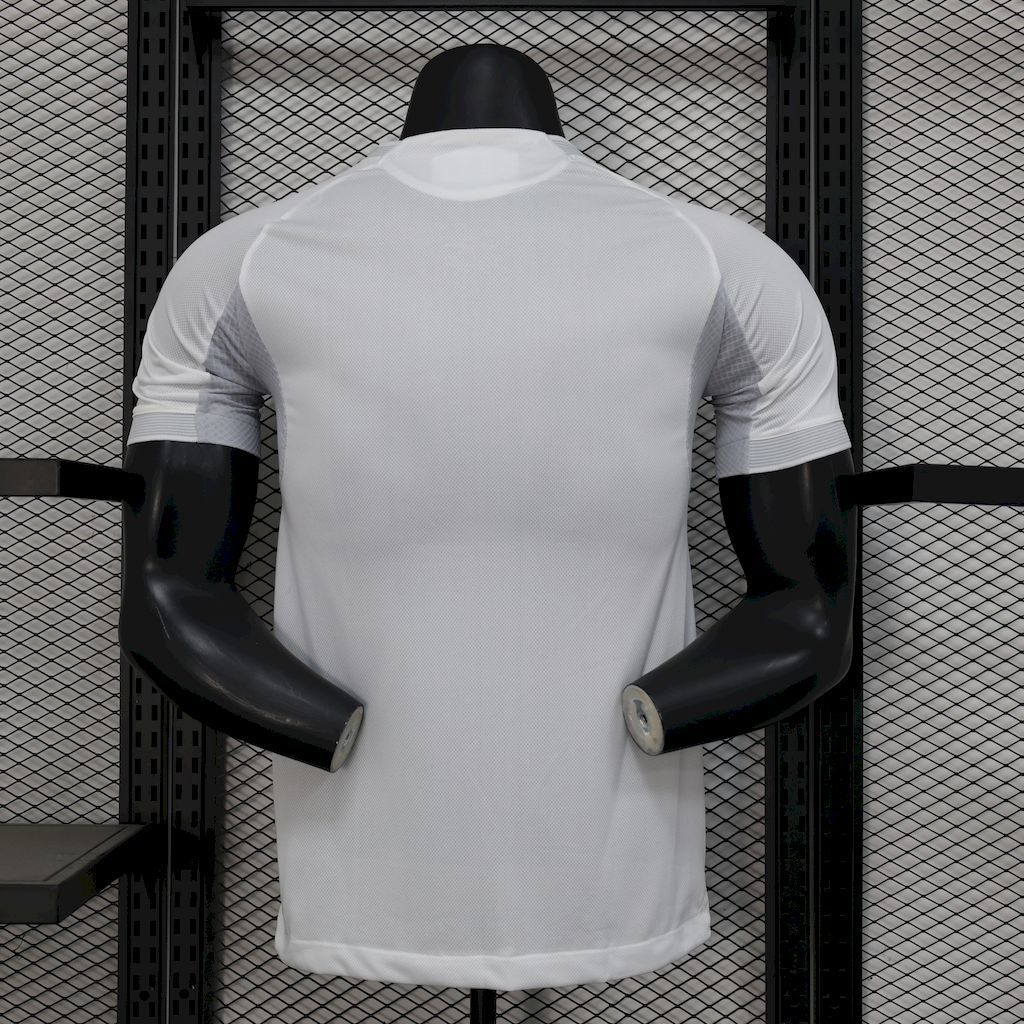 White football jersey back view with yellow piping at collar, fitted athletic cut