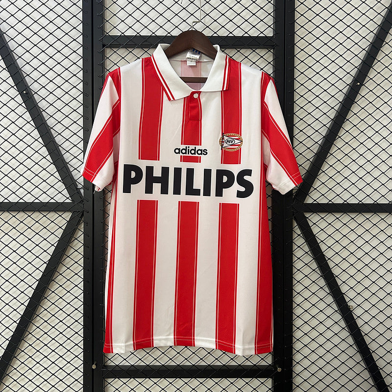 Red-and-white vertical striped soccer jersey with adidas logo, PHILIPS sponsor, and PSV crest
