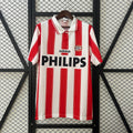 Red-and-white vertical striped soccer jersey with adidas logo, PHILIPS sponsor, and PSV crest