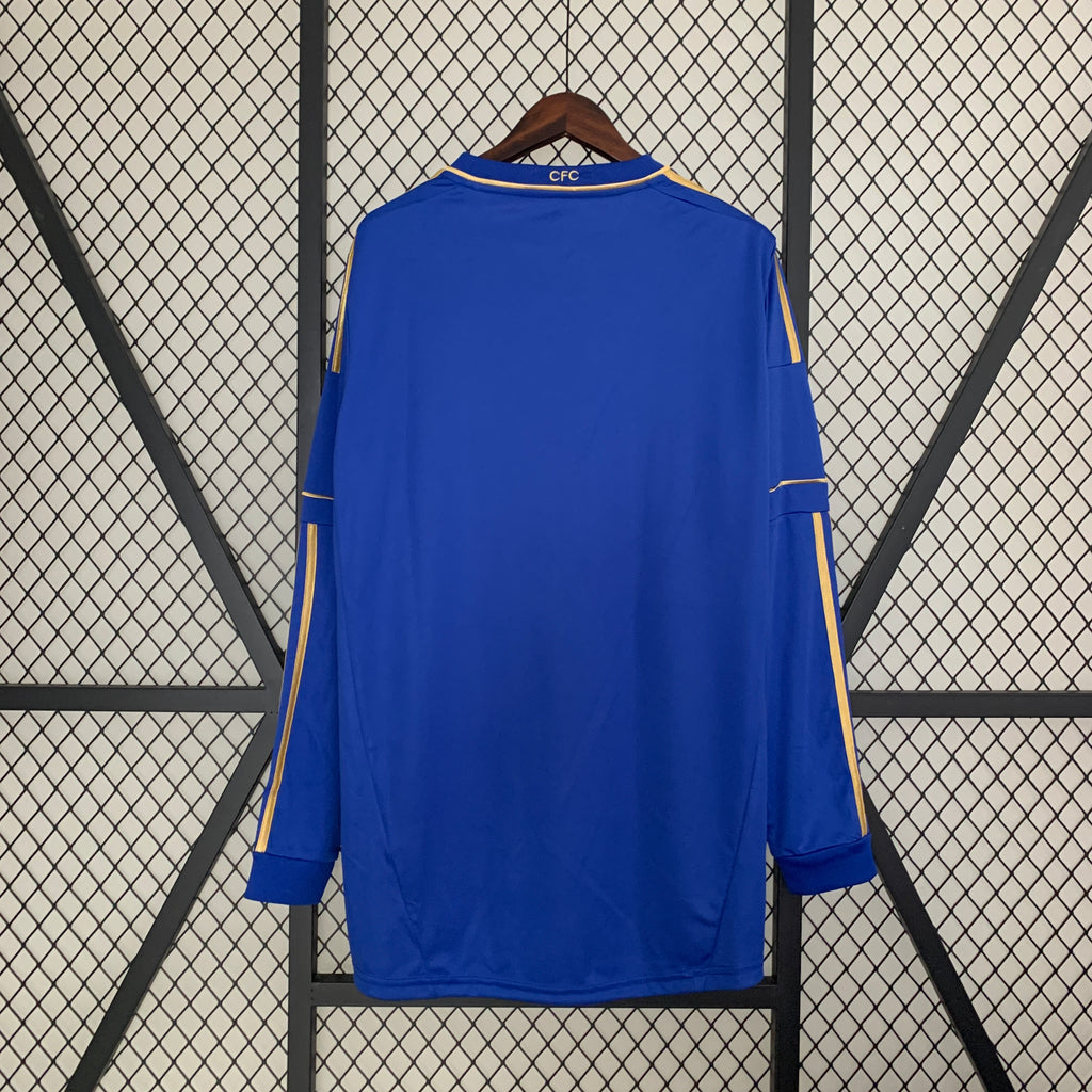 Blue Chelsea home long-sleeve football shirt back view with gold side stripes and CFC collar