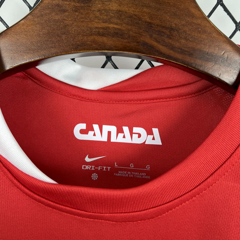Red jersey inner neck shows CANADA text and Dri-FIT label details.