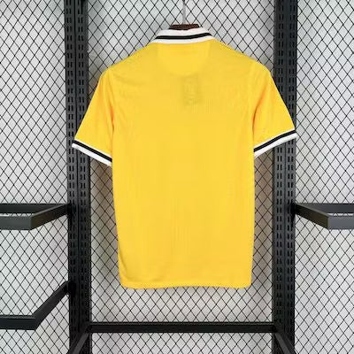Back view of yellow Juventus third retro football jersey with black-trimmed collar
