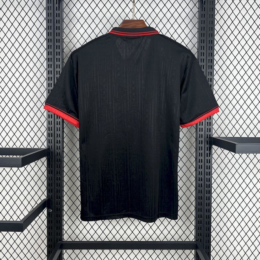 Black AC Milan retro jersey with red-trim collar and short sleeves