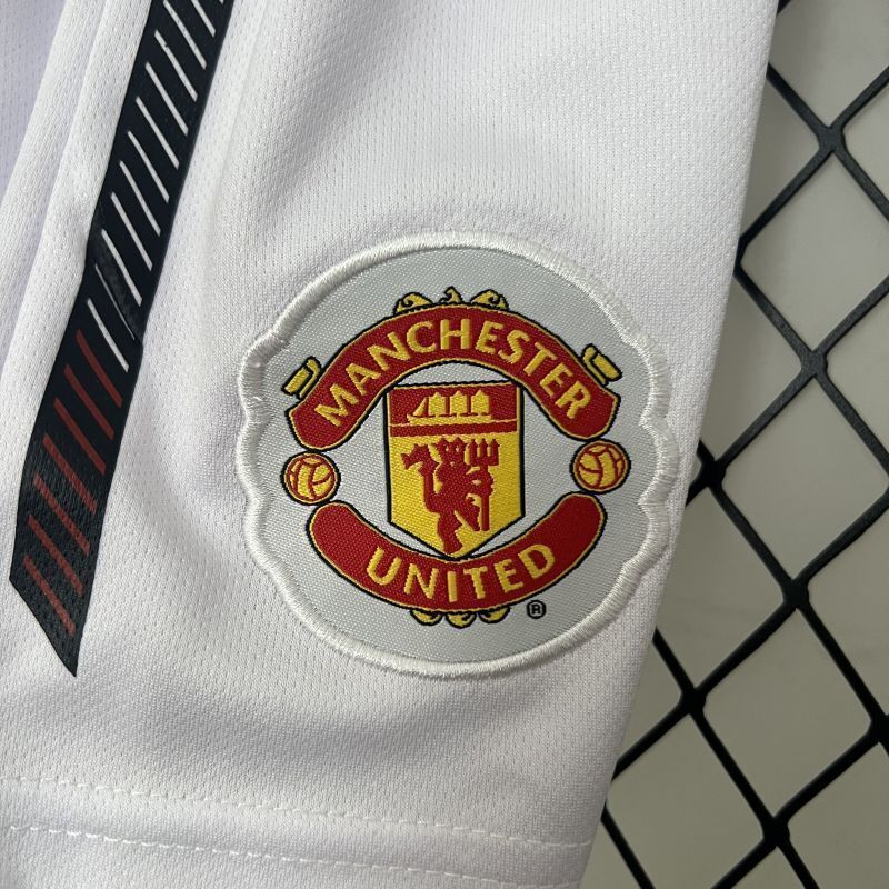 White kid shorts with Manchester United crest patch