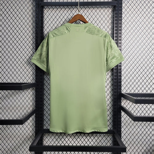 Light green back of Bayern Munich fan jersey with short sleeves and crew neck