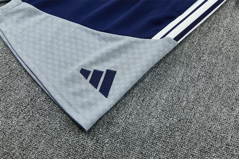 Navy and light gray training jersey collar with Adidas logo on trim.