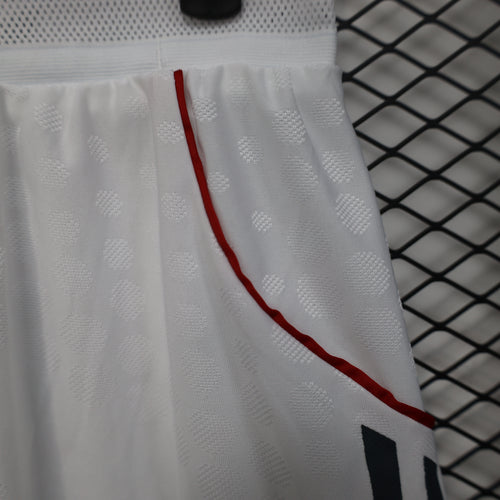 White away player shorts fabric with red curved side seam trim