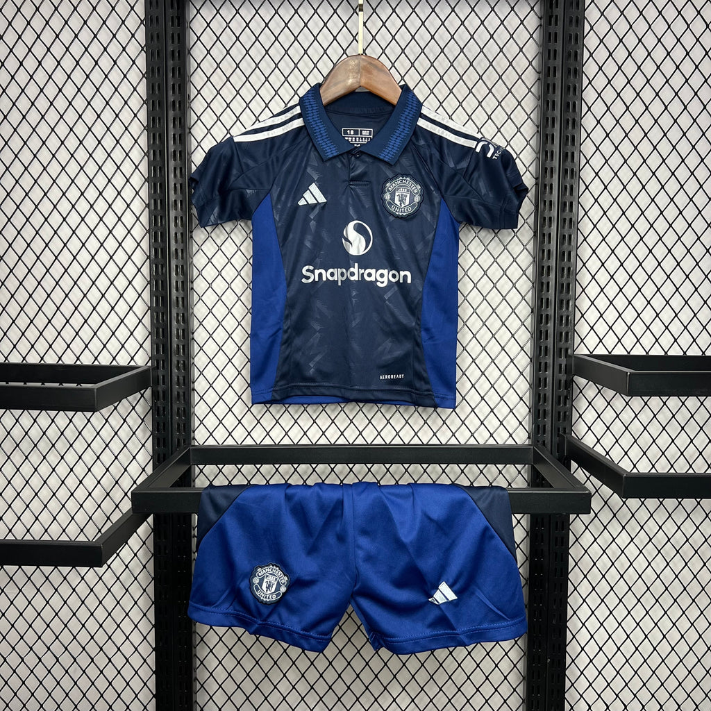 Manchester United 2024/25 kid away jersey and shorts, navy with blue panels