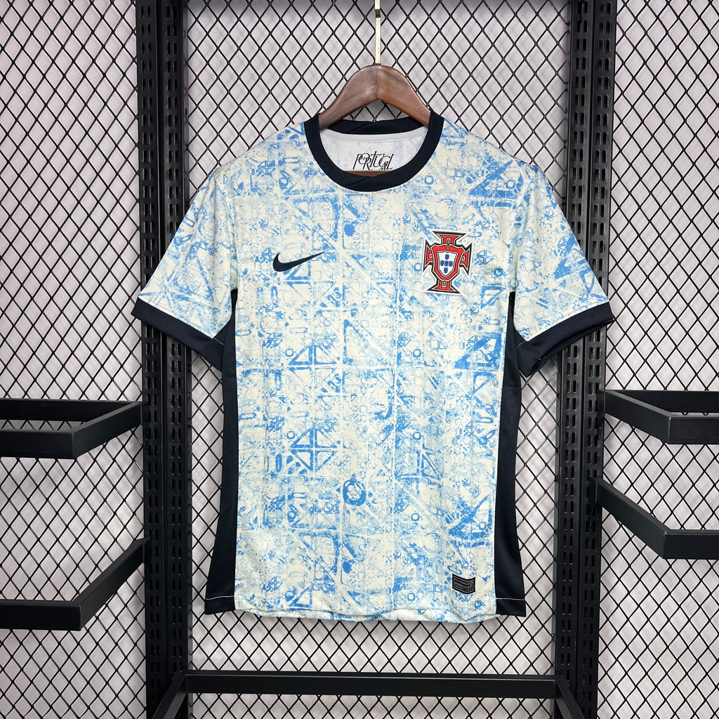Light blue Portugal fan jersey with black trim, Nike logo, and crest badge
