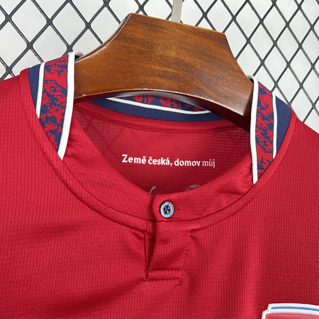 Red jersey neckline with button placket and text at inner collar