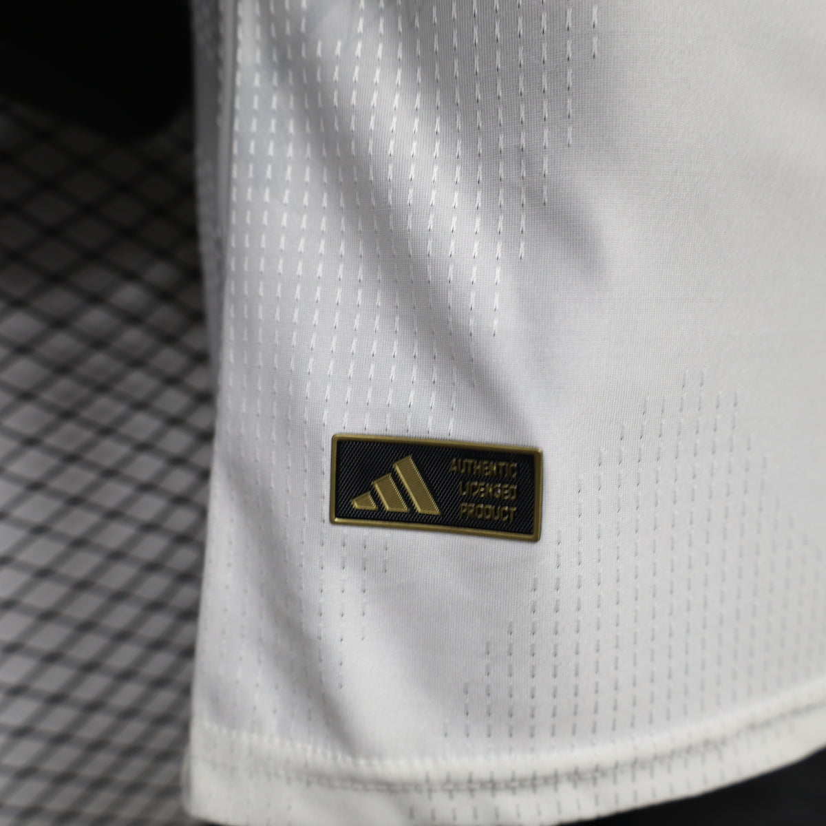 White Manchester United third player football shirt sleeve with adidas logo patch