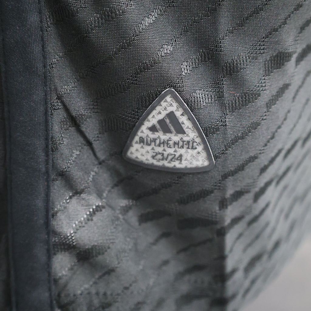 Roma third football jersey, close-up of triangular Authentic 23/24 patch