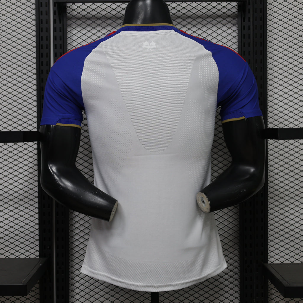Home football shirt back view, white with blue shoulders and yellow collar trim