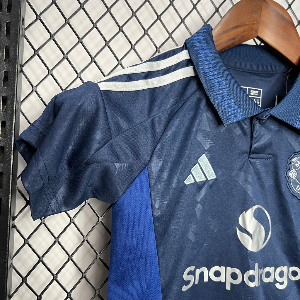 Manchester United kid away jersey close-up, blue collar and adidas logo, navy
