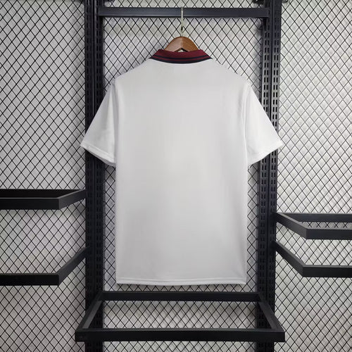 White retro third football shirt with burgundy collar trim, back view