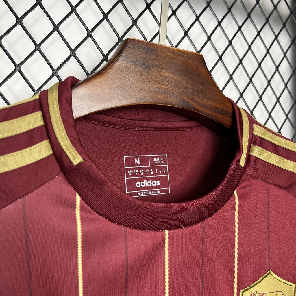 Burgundy Roma home fan jersey neckline with adidas size label and collar trim