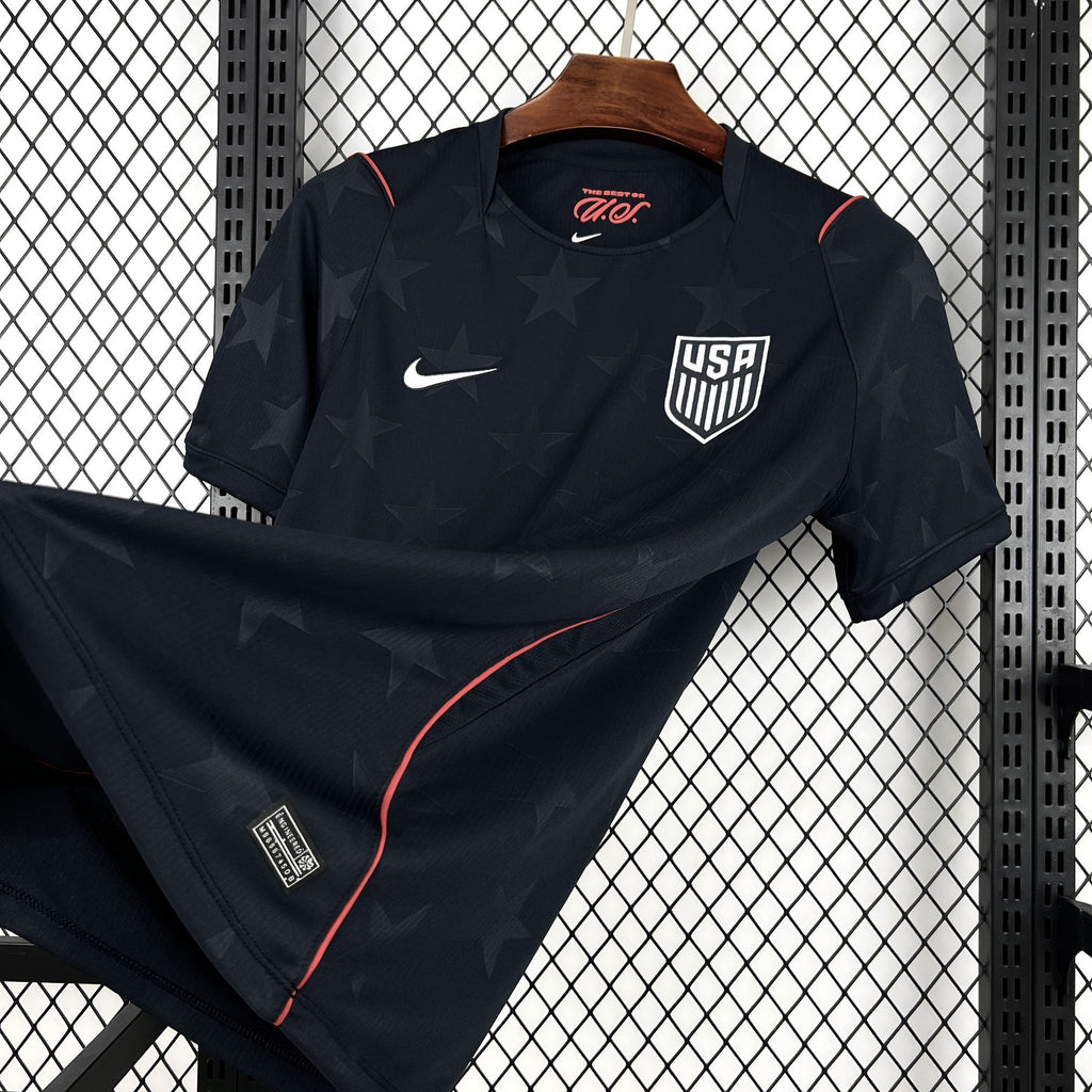 Navy USA 2026 away fan jersey with USA crest, Nike logo, and red piping