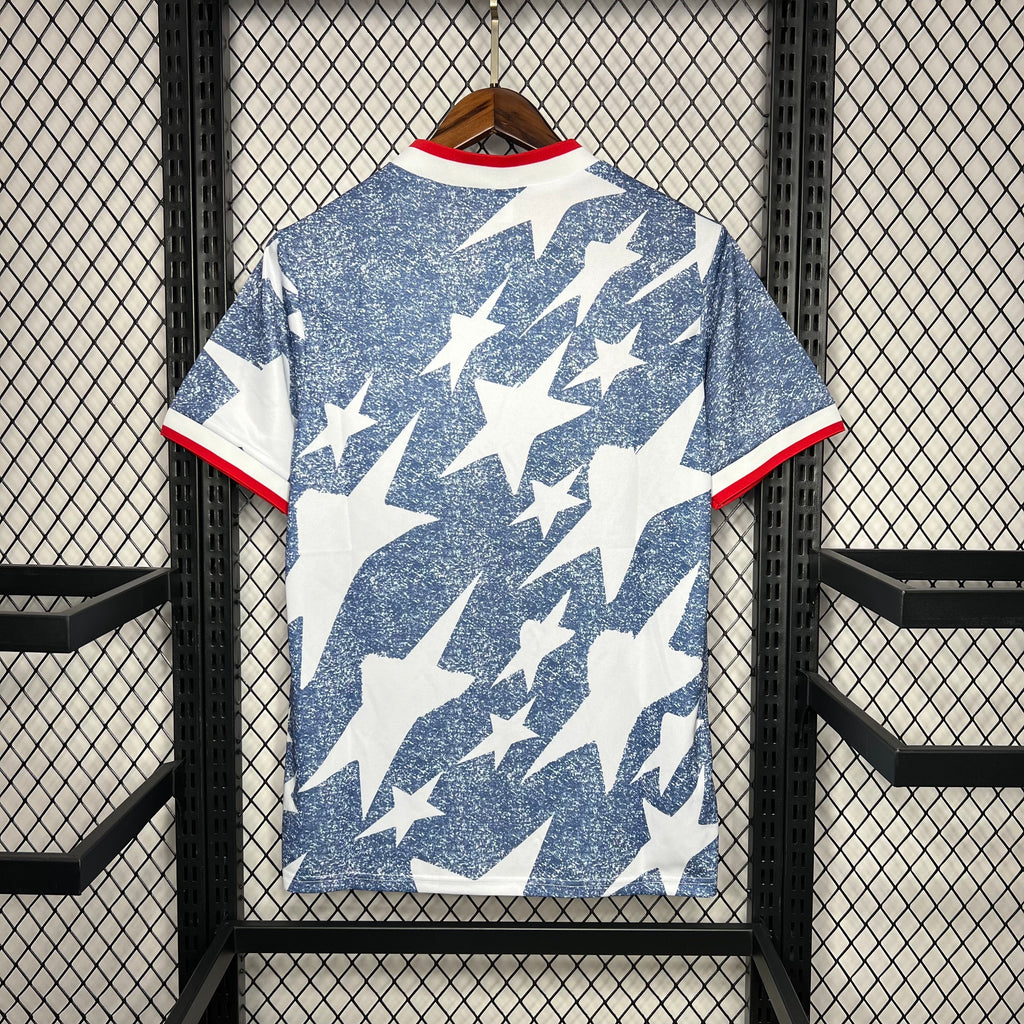 Back view USA 1994 away jersey in blue with large white star pattern, red trim