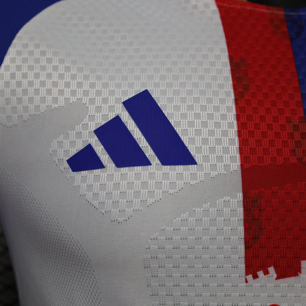 White jersey fabric with blue adidas logo on the chest