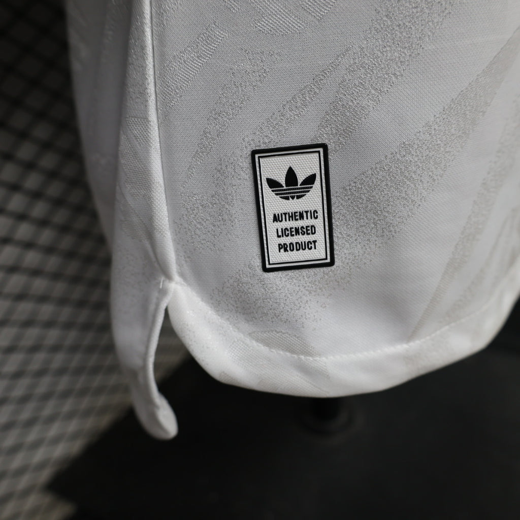 "Authentic Licensed Product" label on white jersey hem