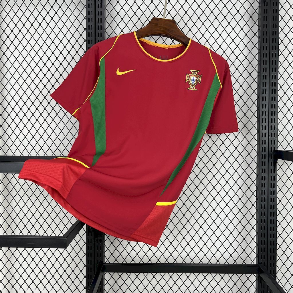 Retro Portugal home football shirt in red with green side panels, gold trim, Nike logo