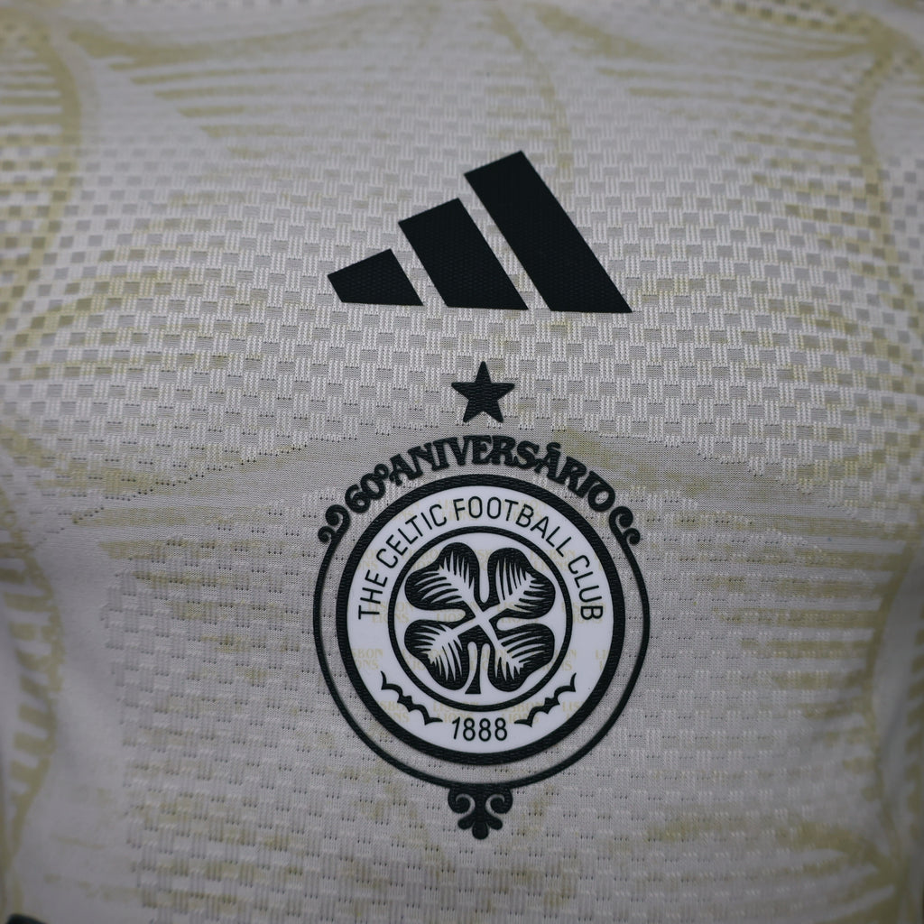 Light yellow jersey with black adidas logo and Celtic FC crest