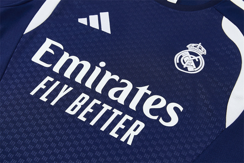 Navy training jersey front with Emirates Fly Better sponsor text and crest.