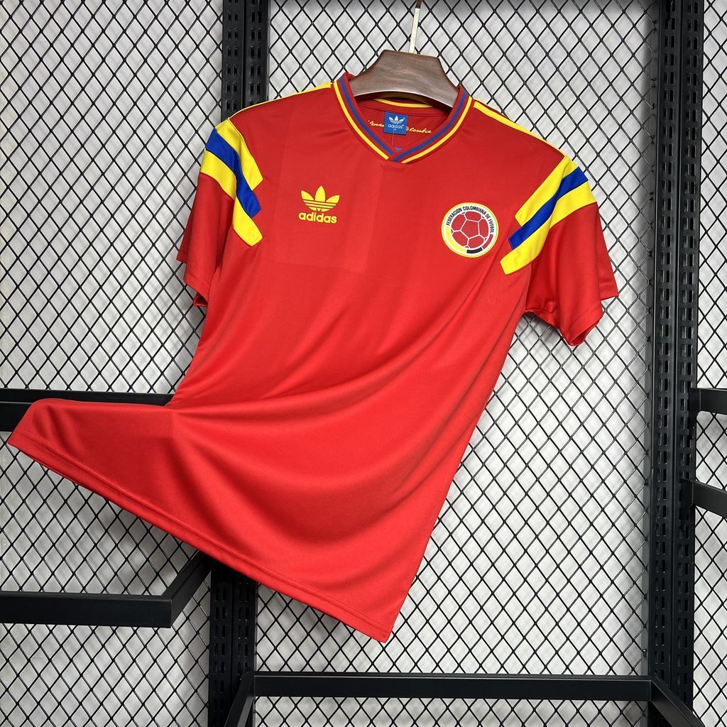Red Colombia retro away soccer jersey with yellow/blue V-neck trim, Adidas logo and crest