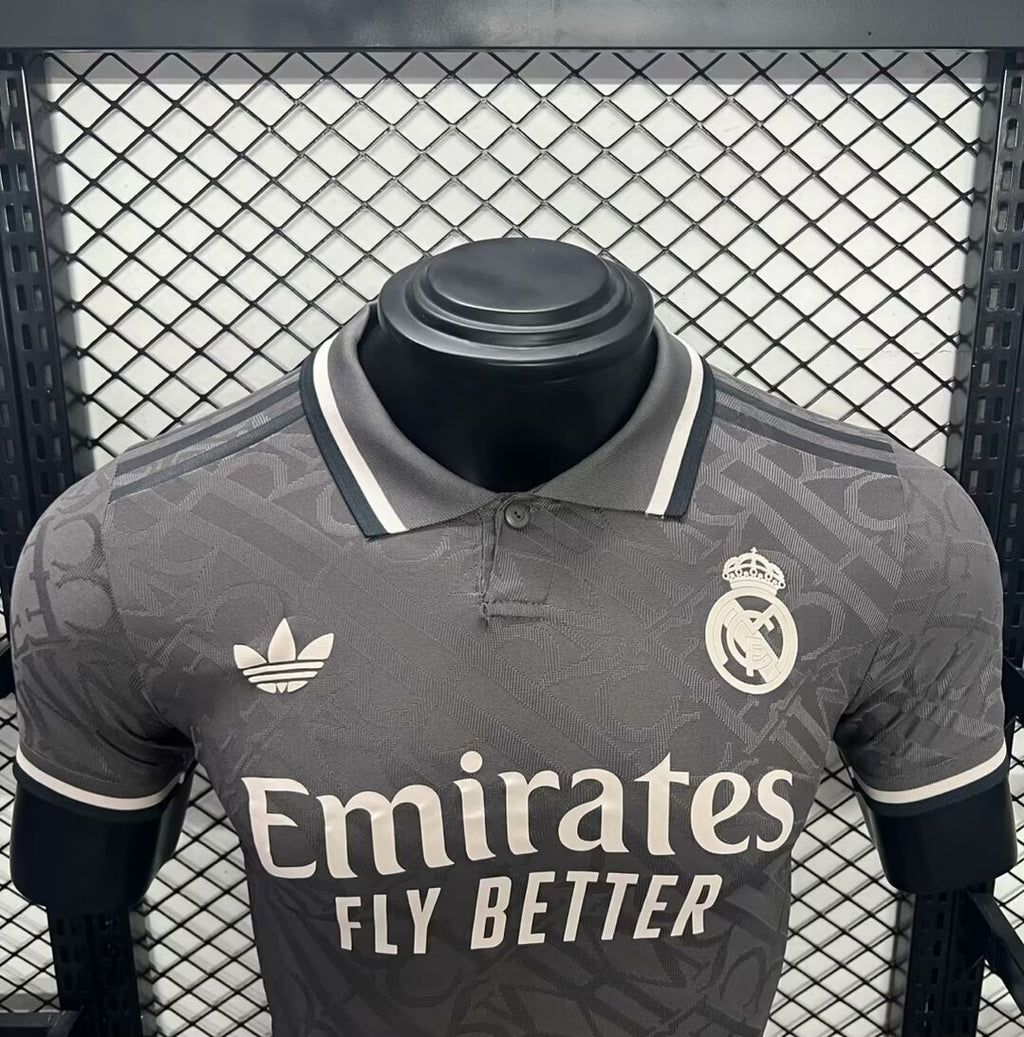 Real Madrid third jersey front close-up, dark gray with white Emirates Fly Better text