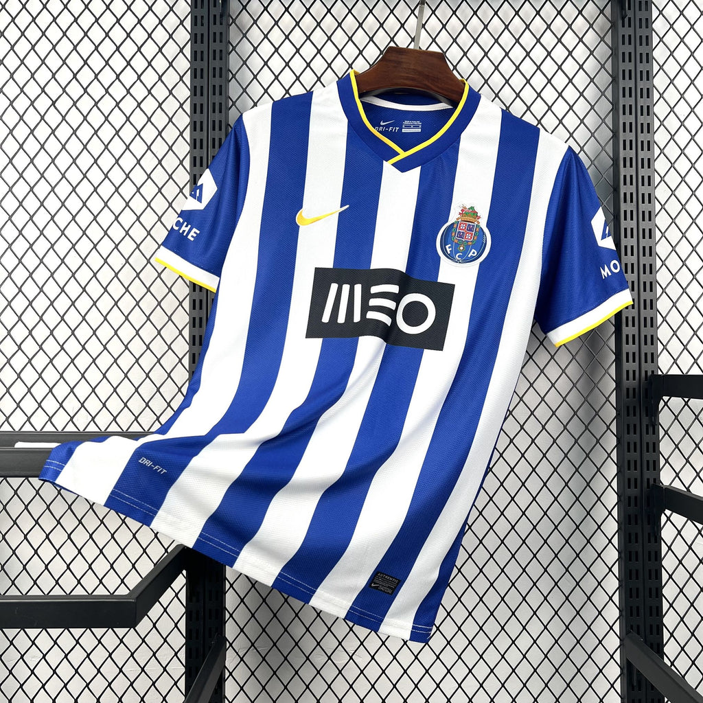 Retro soccer jersey in blue-and-white vertical stripes with crest, sponsor print, and V collar