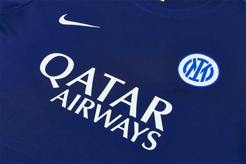 Navy training jersey close-up with QATAR AIRWAYS sponsor, Nike swoosh, Inter crest